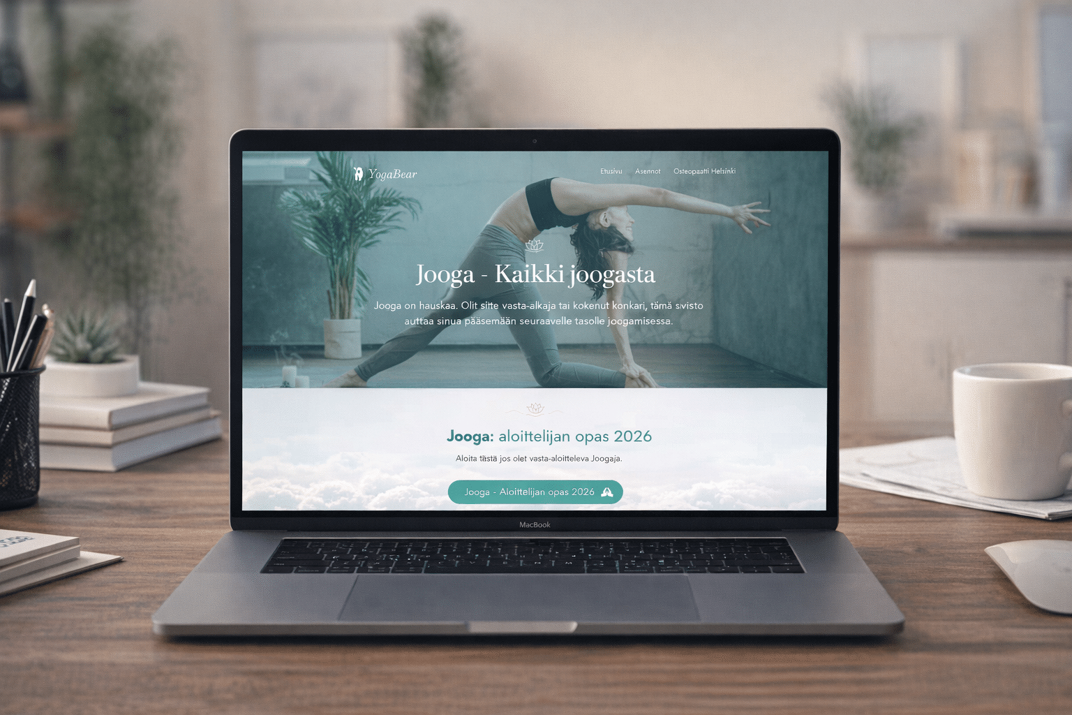 Yogabear.net's front page on a laptop: a woman doing yoga and the headline “Jooga – Kaikki joogasta” (yoga: all about yoga)